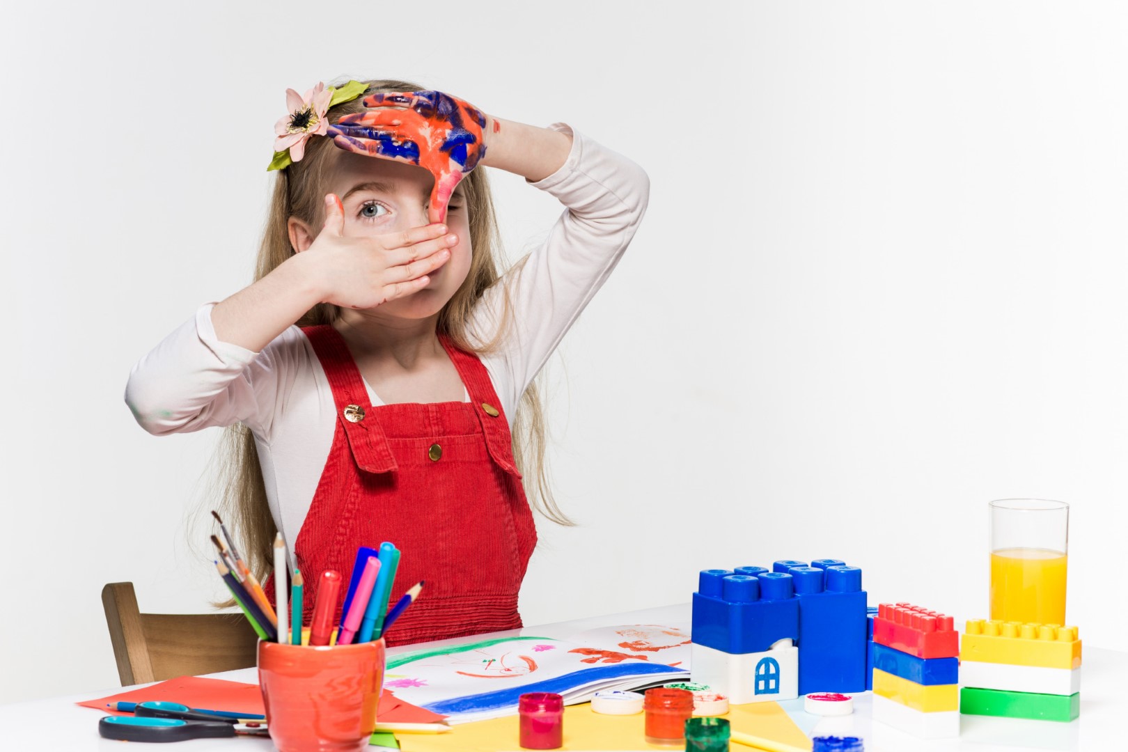 beautiful-little-girl-with-hands-paint-low